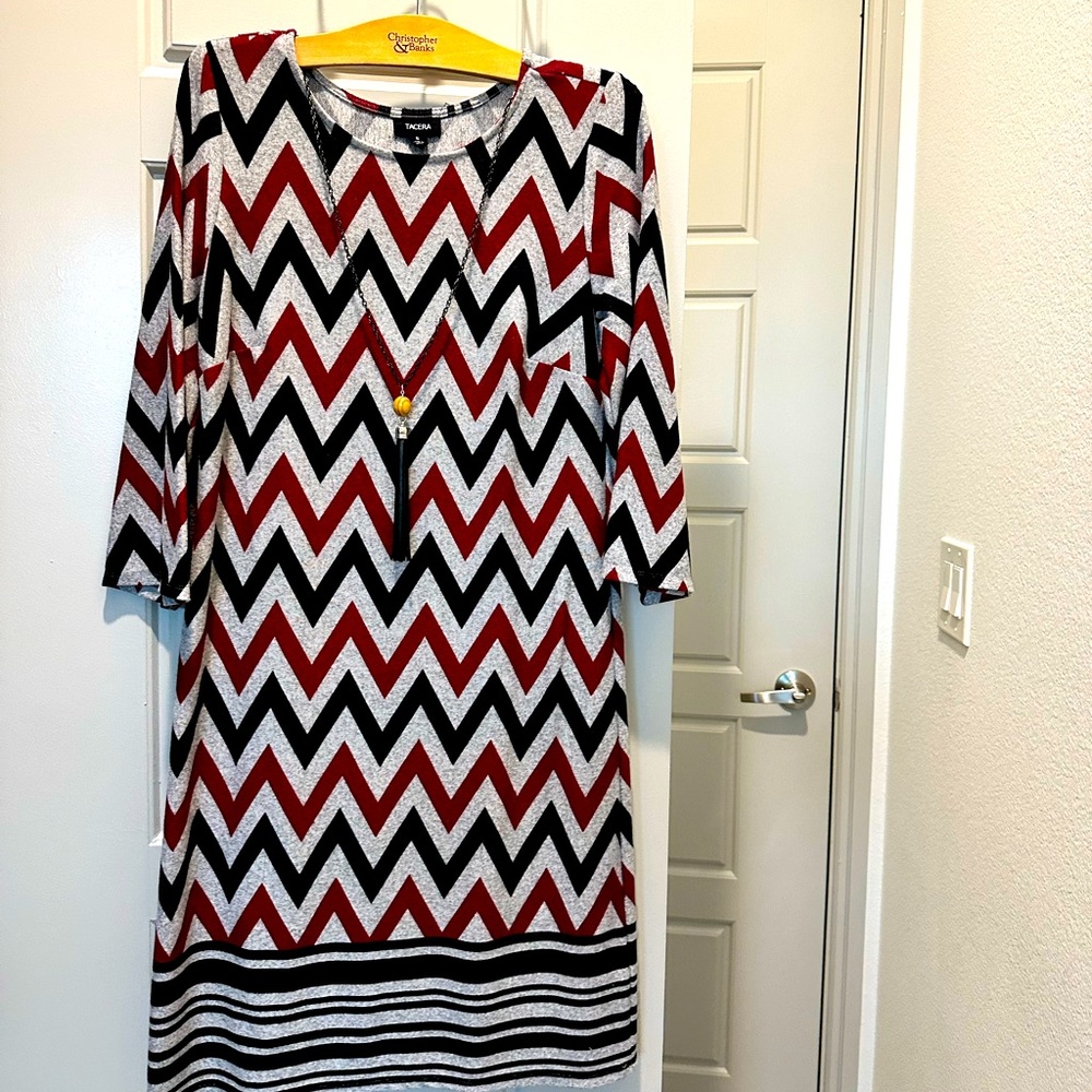 Small chevron ladies dress with a tassel necklace